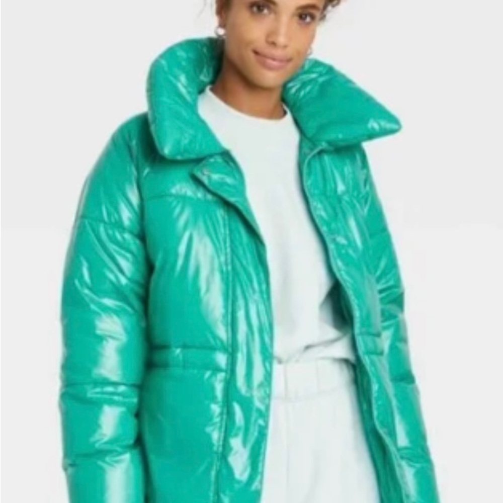 Woman’s medium length wet look  puffer jacket, a new day Jade S green
